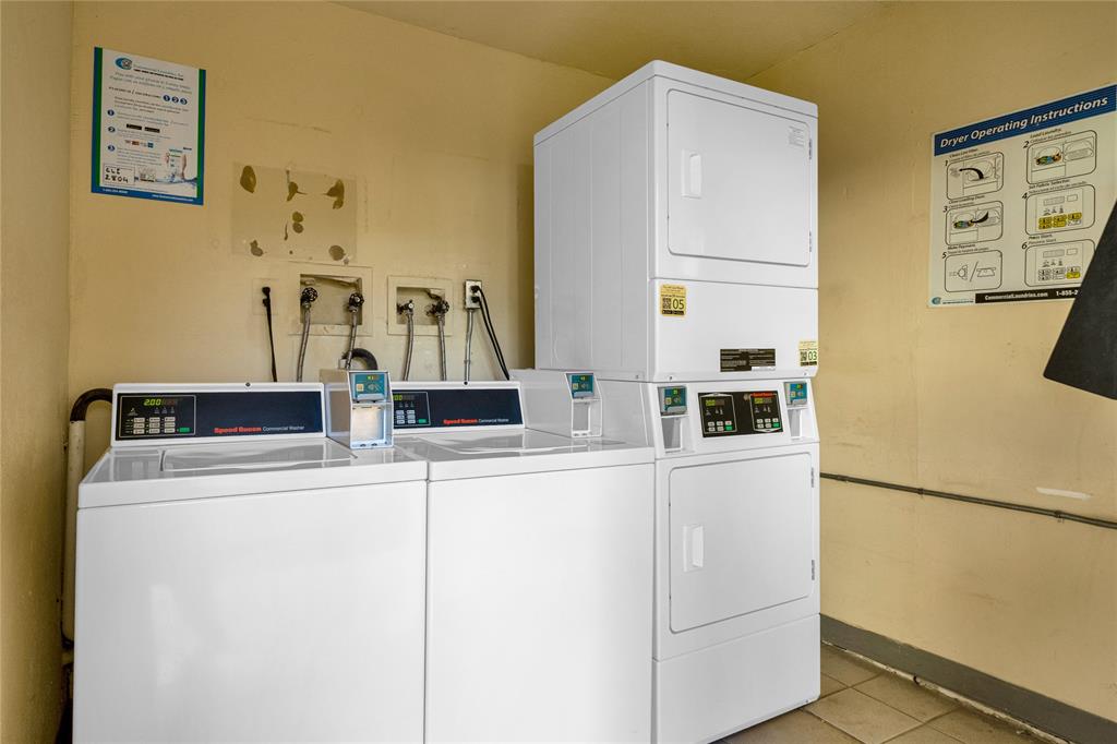 8600 Southwest 109th Avenue, Unit 4101 Miami, FL 33173 - Photo 24 of 34 a kitchen with cabinets and refrigerator