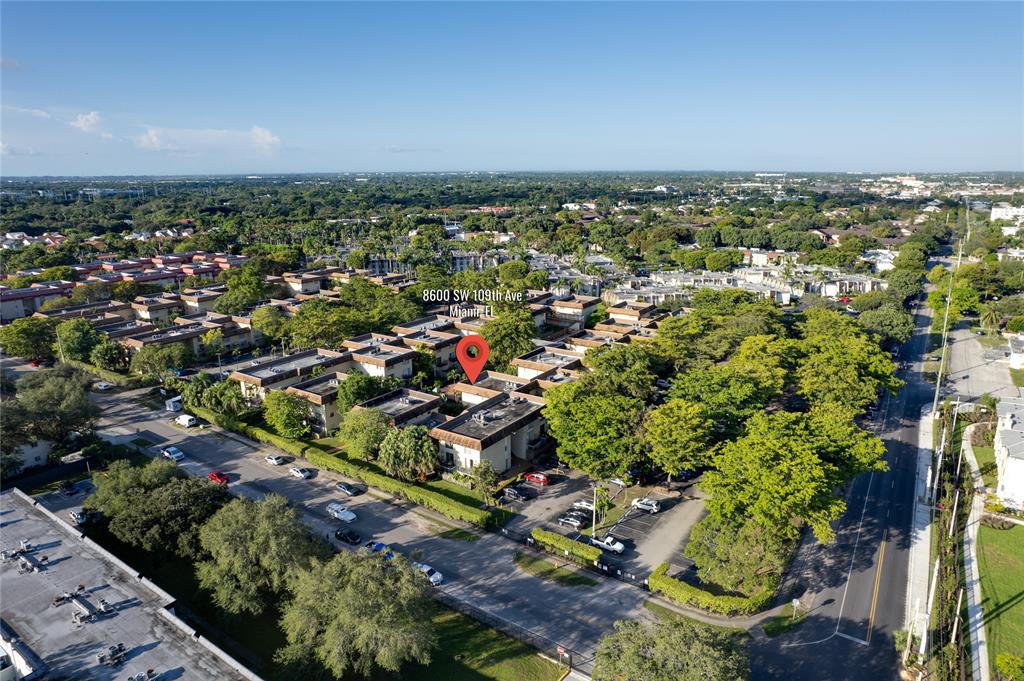 8600 Southwest 109th Avenue, Unit 4101 Miami, FL 33173 - Photo 30 of 34 an aerial view of a city with lots of residential buildings