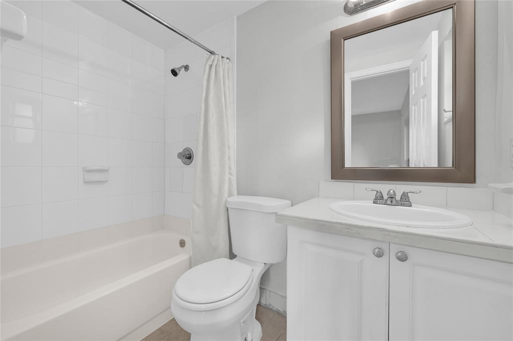 8600 Southwest 109th Avenue, Unit 4101 Miami, FL 33173 - Photo 10 of 34 a bathroom with a sink toilet and shower