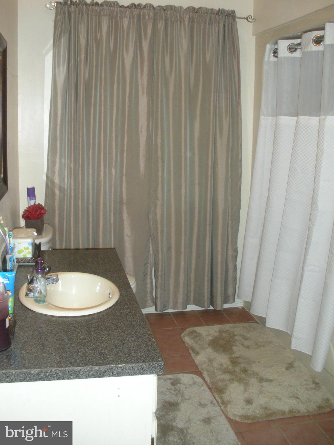 12309 Gramlich Road Southwest La Vale, MD 21502 - Photo 16 of 30 a bathroom with a sink and a mirror