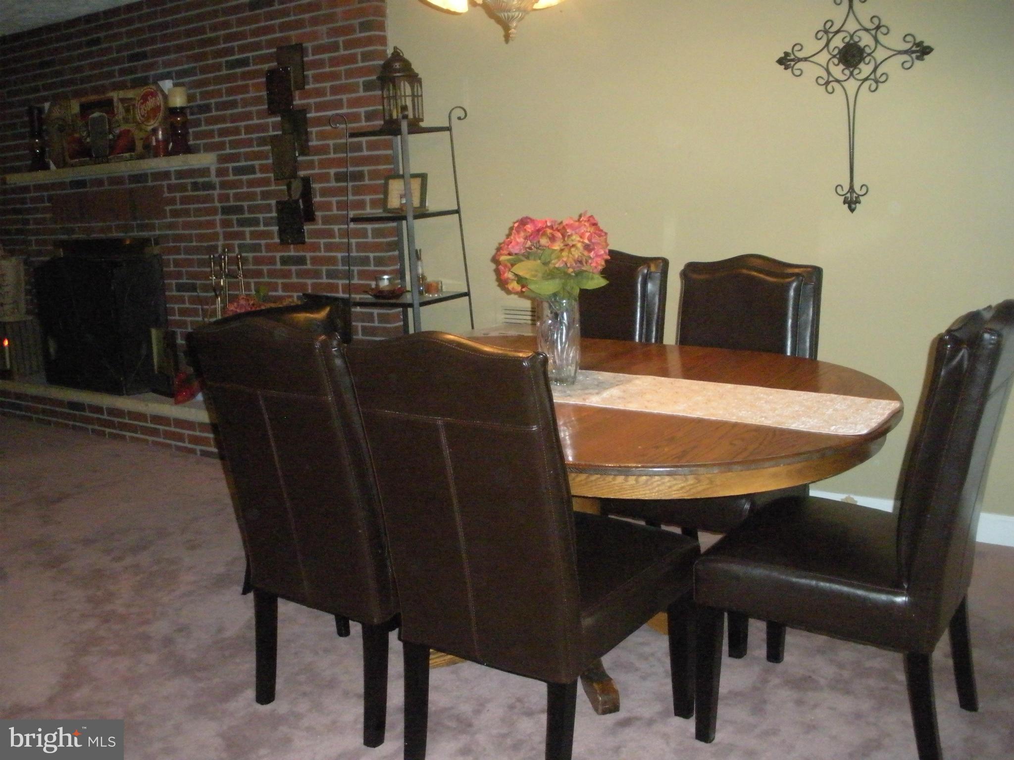 12309 Gramlich Road Southwest La Vale, MD 21502 - Photo 6 of 30 a view of a dining room with furniture