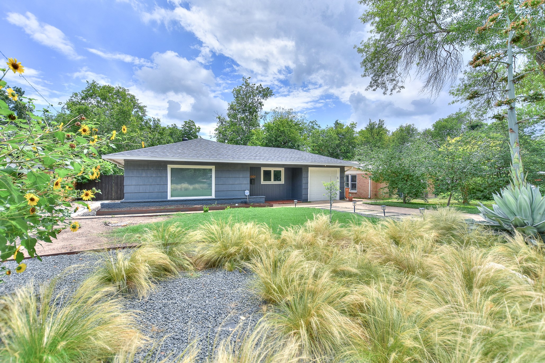 1309 Ridgemont Drive Austin, TX 78723 - Photo 3 of 35 Beautiful drought tolerant landscaping