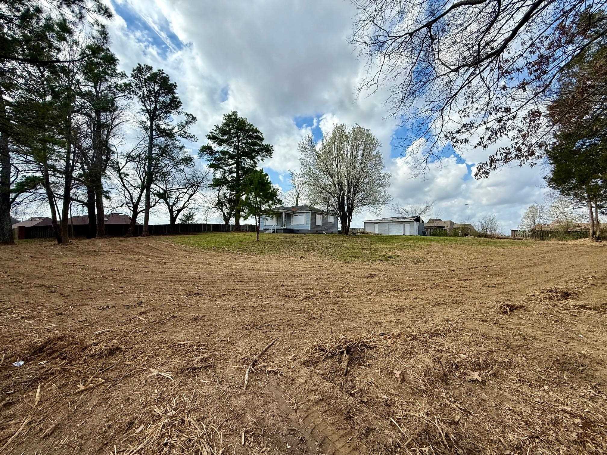 3133 Brunswick Road Bartlett, TN 38133 - Photo 7 of 8 a view of a yard with an trees