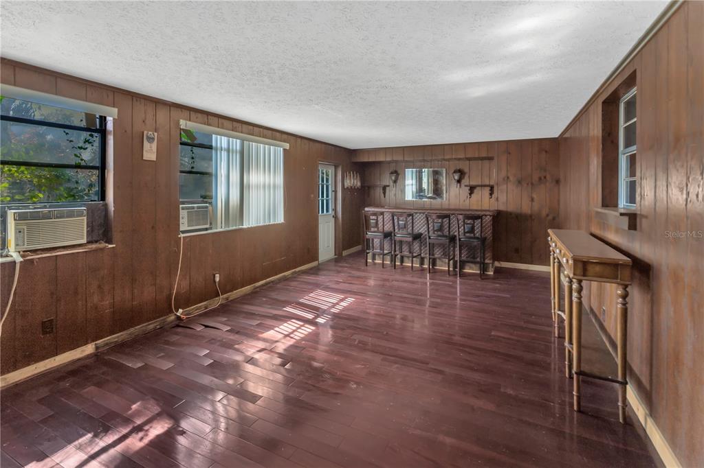 310 Kenmore Road Brandon, FL 33511 - Photo 11 of 33 a view of a livingroom with furniture window and wooden floor