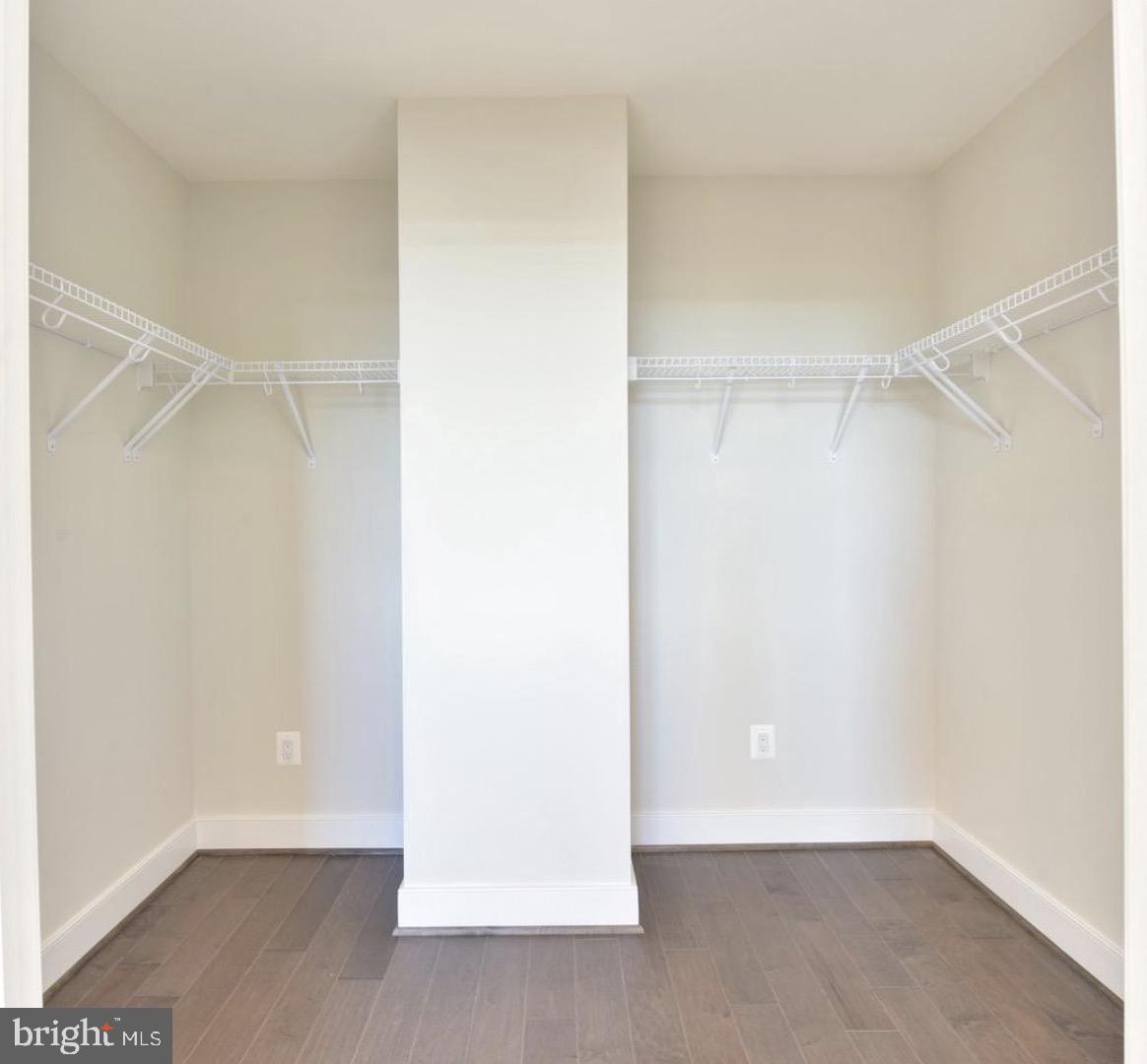 2815 24th Road South Arlington, VA 22206 - Photo 18 of 27 a view of an empty walk in closet with wooden floor