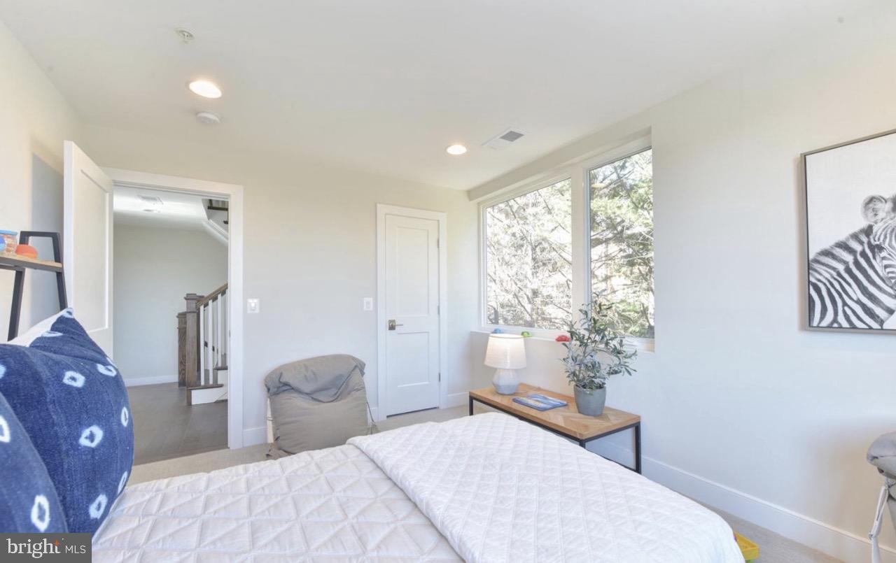 2815 24th Road South Arlington, VA 22206 - Photo 20 of 27 a bedroom with a large bed and a window