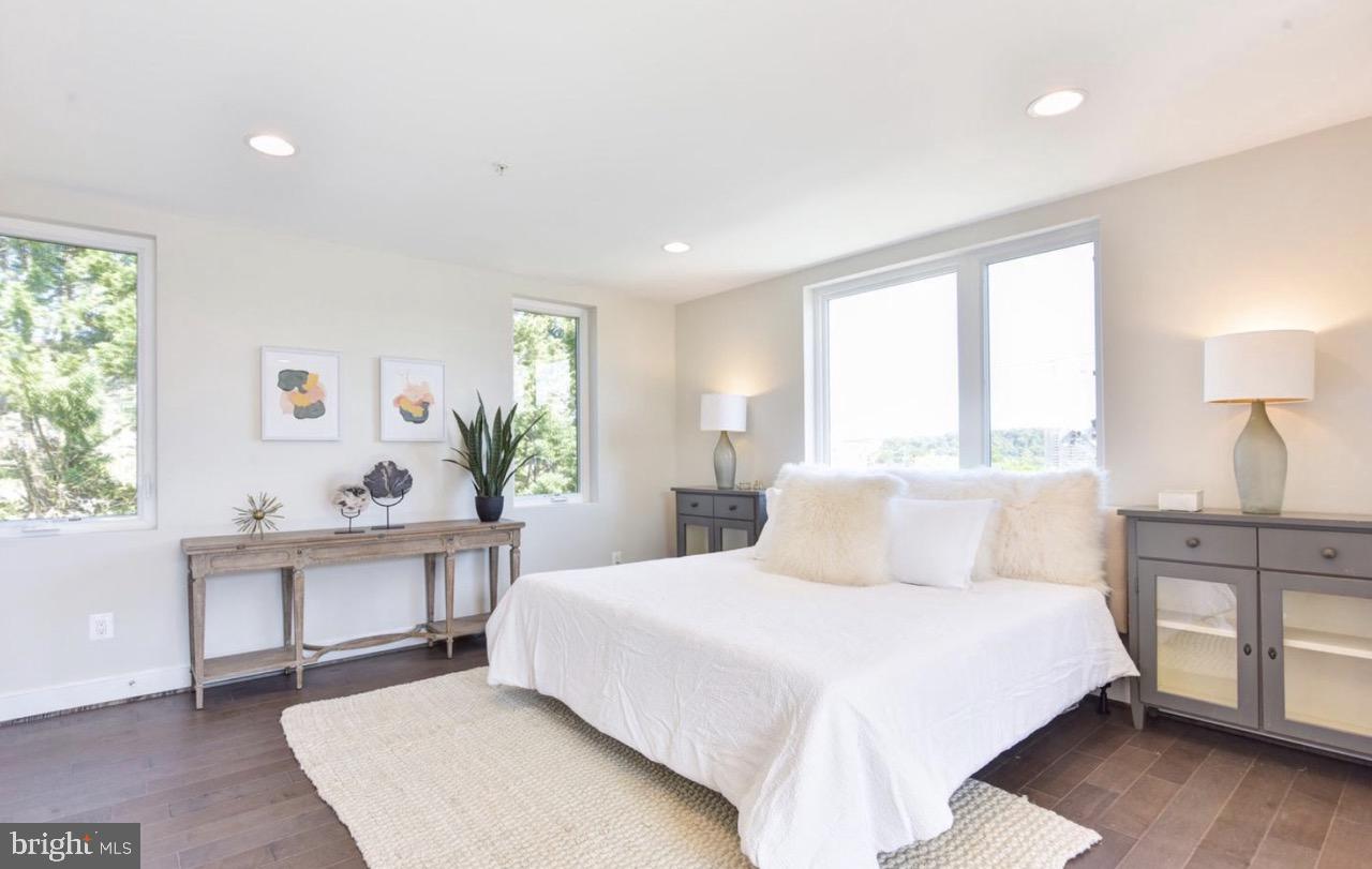 2815 24th Road South Arlington, VA 22206 - Photo 23 of 27 a bedroom with a bed and a table