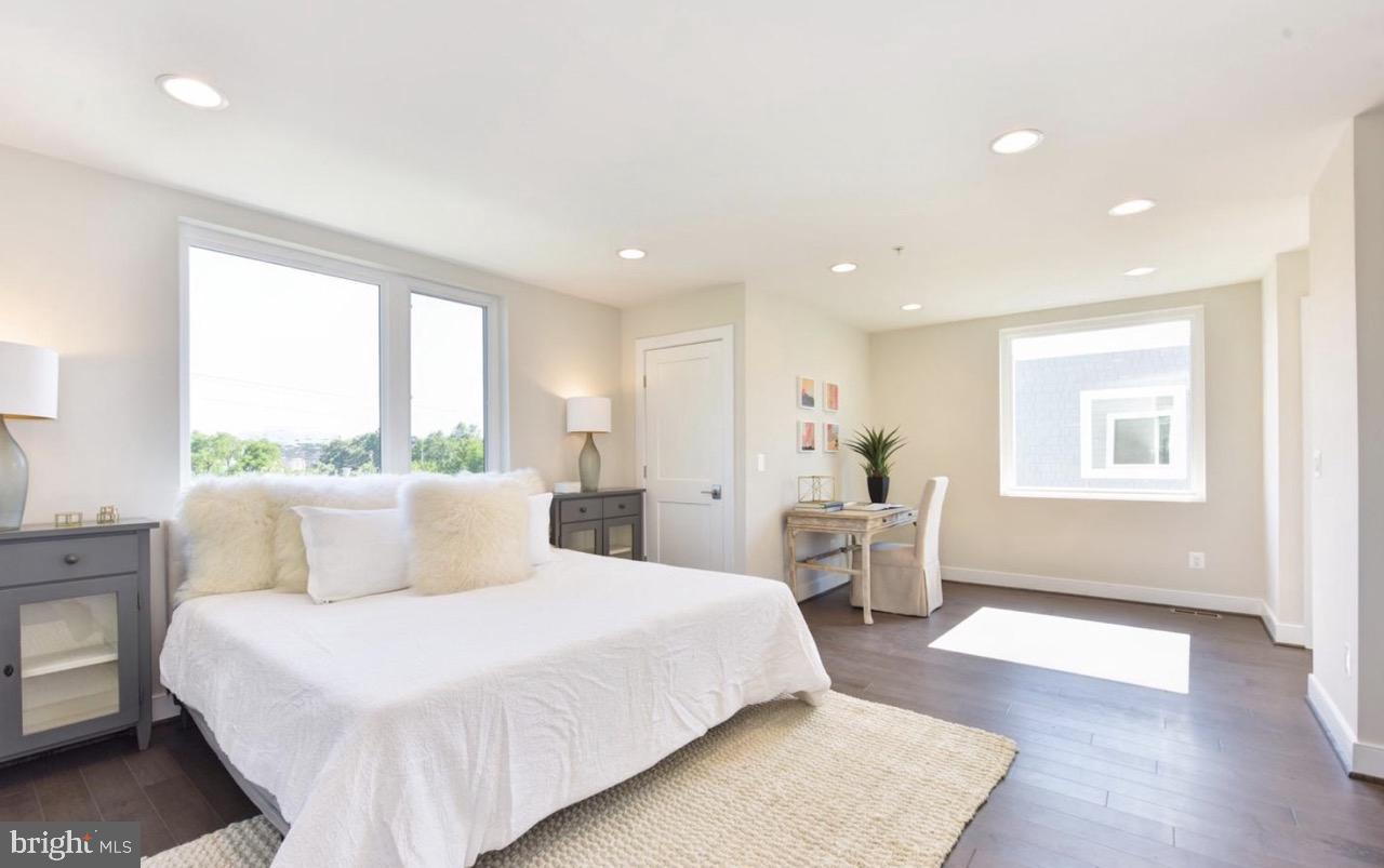 2815 24th Road South Arlington, VA 22206 - Photo 24 of 27 a bedroom with a large bed and a window