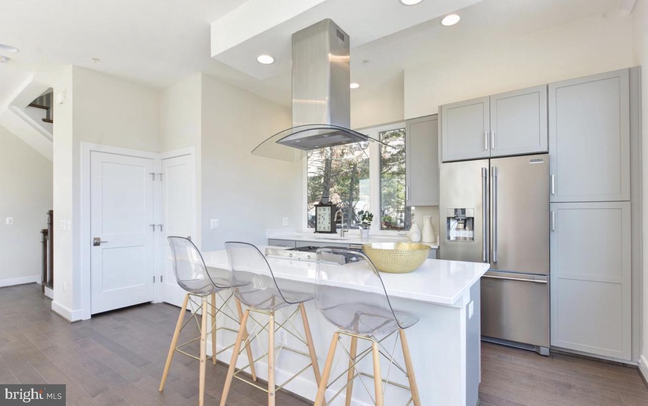 2815 24th Road South Arlington, VA 22206 - Photo 10 of 27 a view of a dining room with furniture and a chandelier