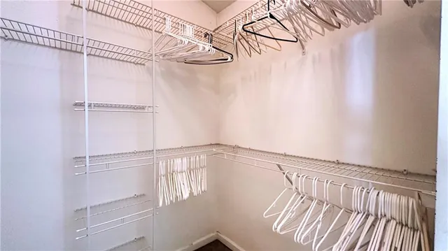 a view of a room with racks on the wall