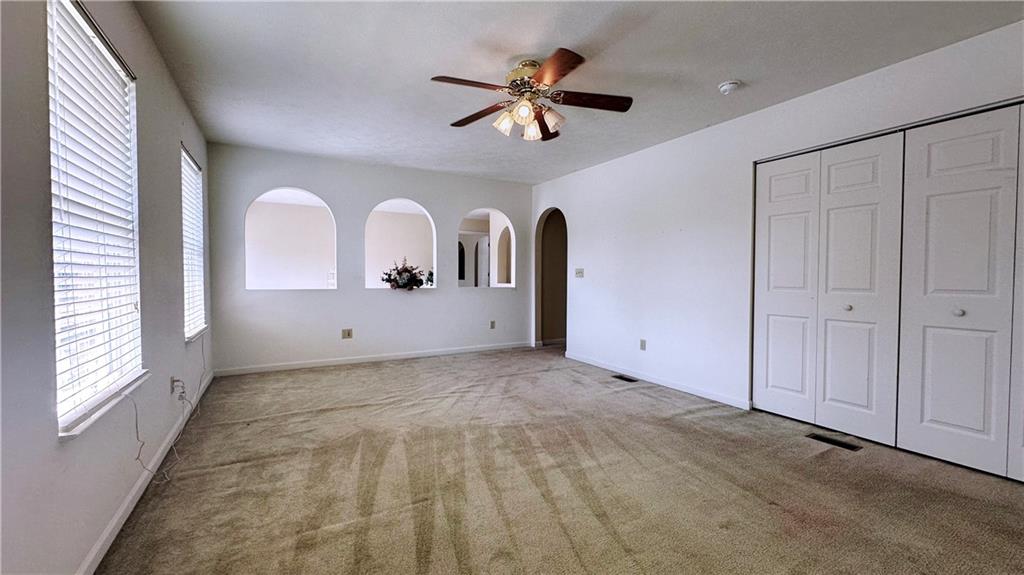 440 Chapeldale Drive Apollo, PA 15613 - Photo 30 of 48 a view of a livingroom with a ceiling fan and window