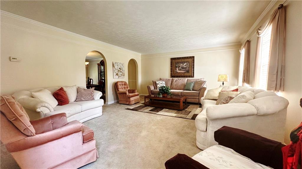 440 Chapeldale Drive Apollo, PA 15613 - Photo 8 of 48 a living room with furniture and a large window