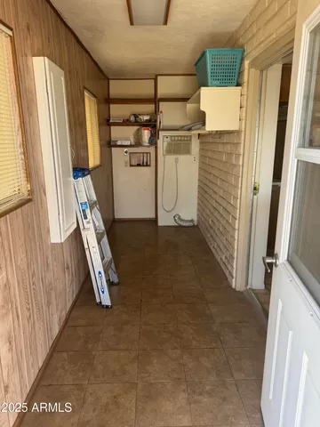 a view of a building with a large tree