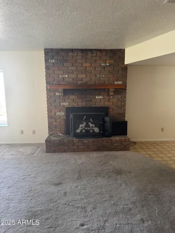 a view of a lake in middle of forest