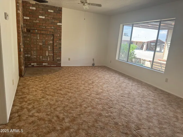 a kitchen with stainless steel appliances a sink and a refrigerator