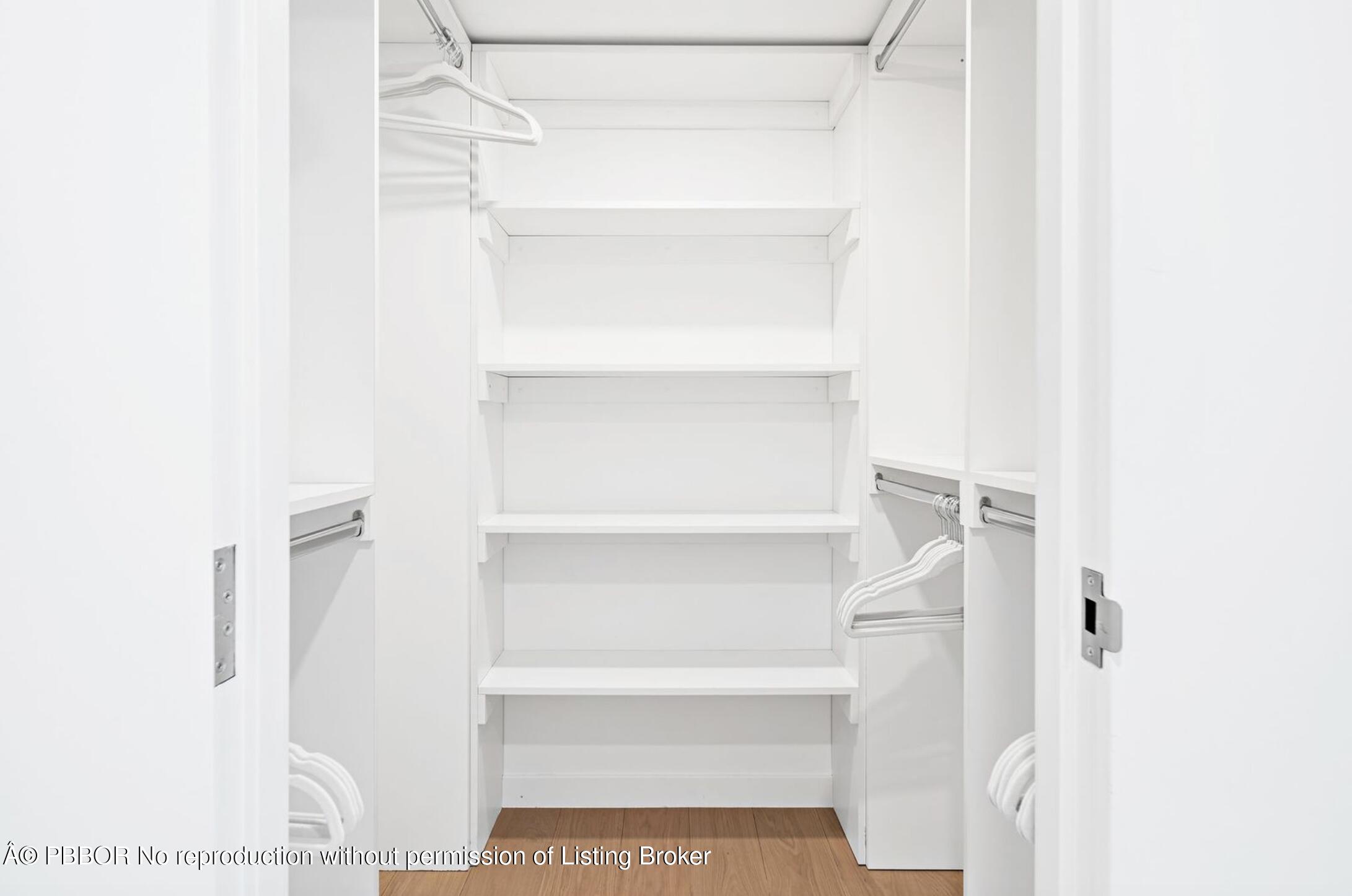 333 Sunset Avenue, Unit 512 Palm Beach, FL 33480 - Photo 13 of 29 a view of walk in closet with empty racks