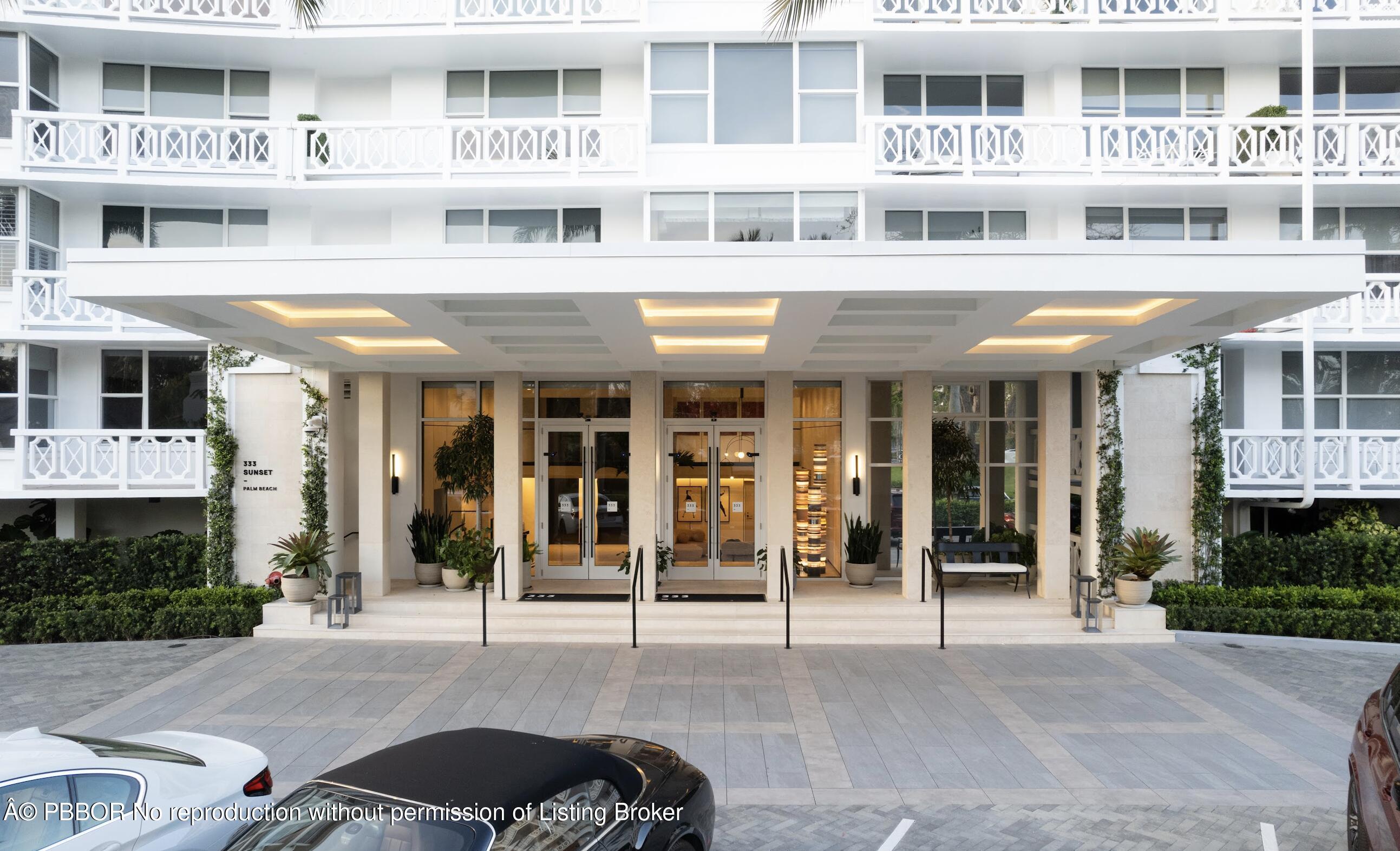 333 Sunset Avenue, Unit 512 Palm Beach, FL 33480 - Photo 2 of 29 a front view of a building with a glass windows
