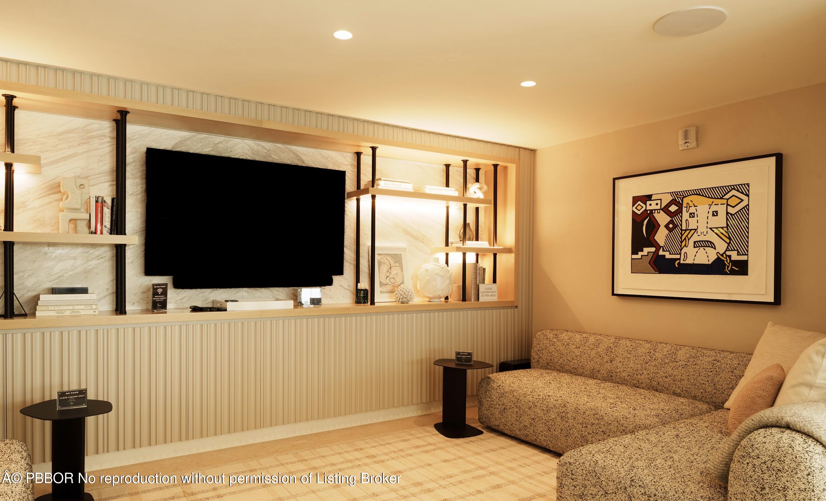 333 Sunset Avenue, Unit 512 Palm Beach, FL 33480 - Photo 21 of 29 a living room with furniture and a flat screen tv