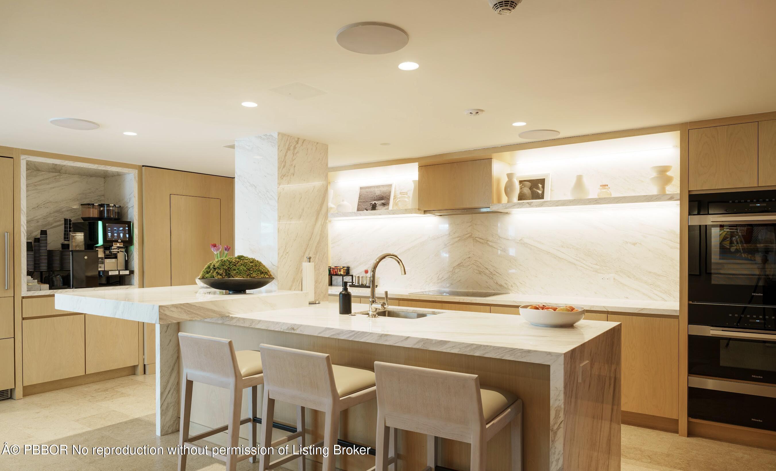 333 Sunset Avenue, Unit 512 Palm Beach, FL 33480 - Photo 22 of 29 a kitchen with a sink and refrigerator