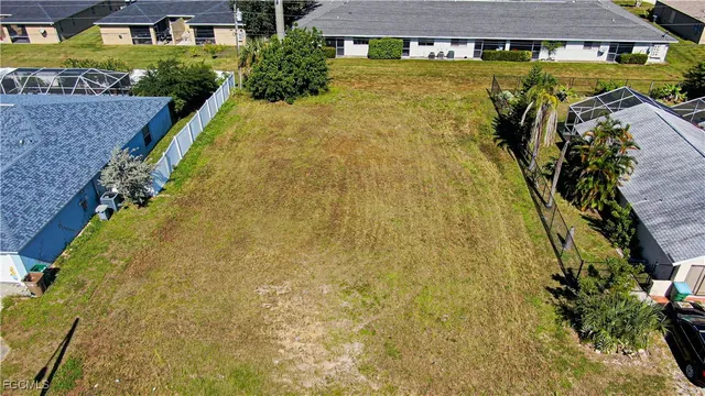 a view of swimming pool with a garden