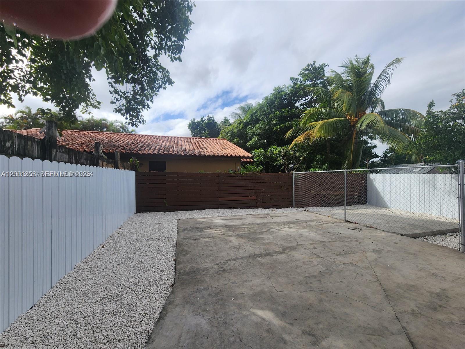 1726 Southwest 25th Avenue, Unit 1 Miami, FL 33145 - Photo 13 of 14 a backyard of a house