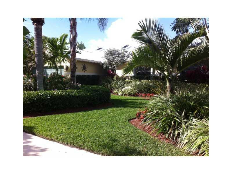 7697 West Country Club Boulevard Boca Raton, FL 33487 - Photo 3 of 11 Exterior Front