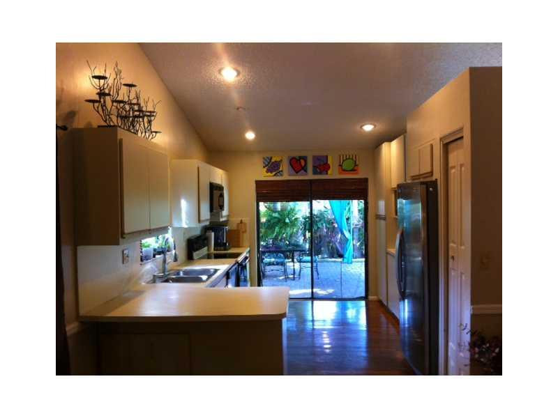 7697 West Country Club Boulevard Boca Raton, FL 33487 - Photo 10 of 11 Exterior Front
