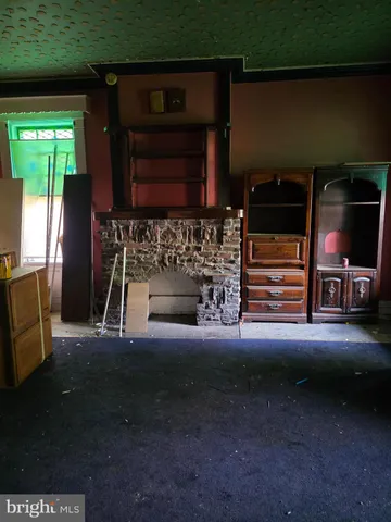 a living room with a fireplace