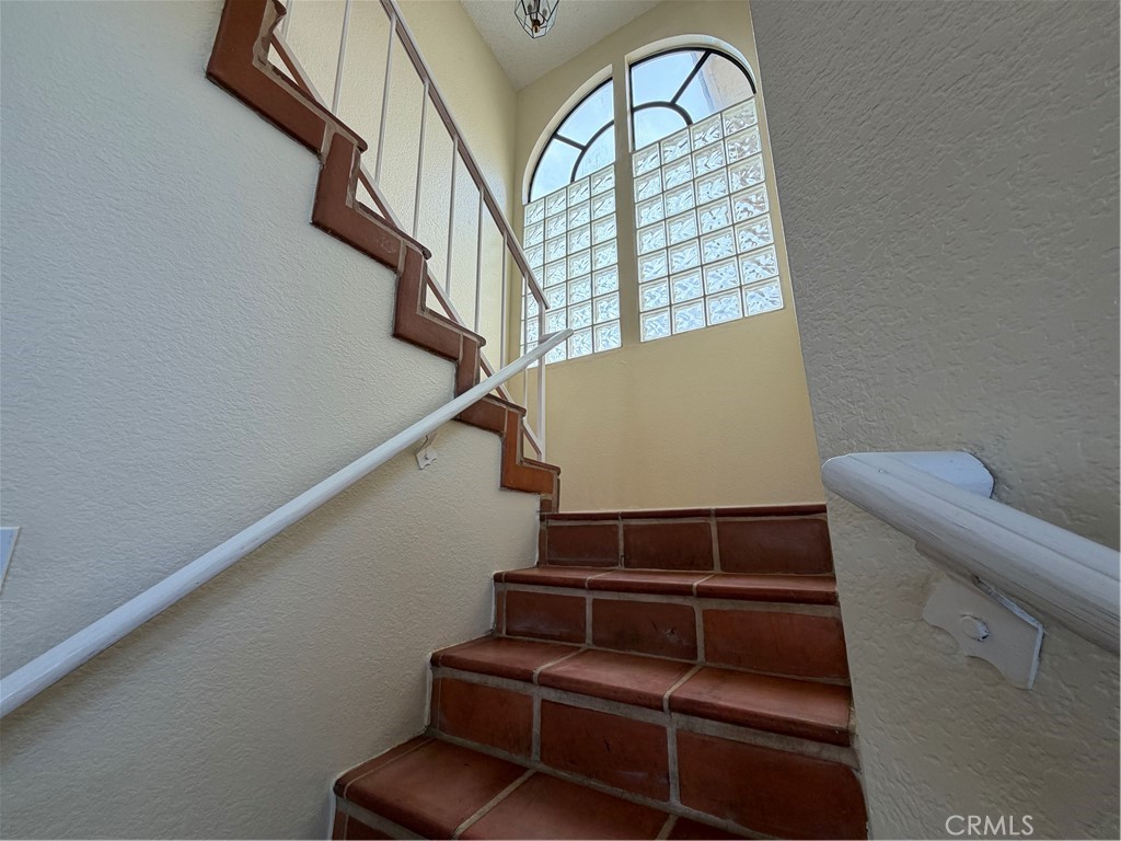 2560 East Ave R12 Palmdale, CA 93550 - Photo 13 of 26 a view of entryway and hall with wooden floor