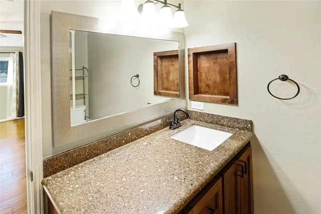 a view of a hallway with a white walls