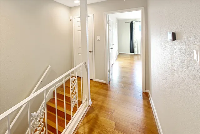 a view of a house with a wooden stairs