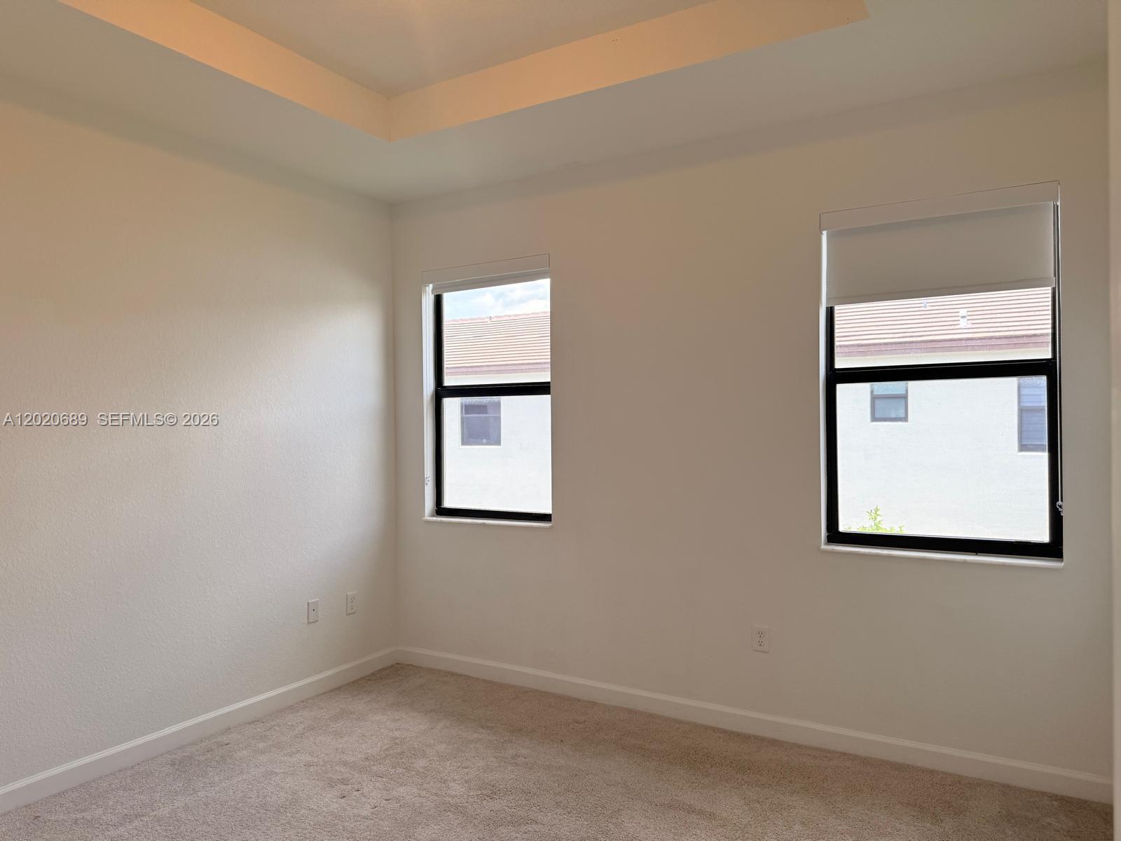 12875 Southwest 231st Terrace Miami, FL 33170 - Photo 12 of 25 an empty room with windows