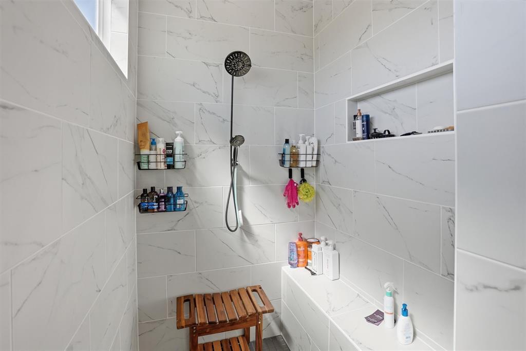 6620 Buffalo Ridge Circle Godley, TX 76044 - Photo 22 of 40 a bathroom with a bathtub and a shower
