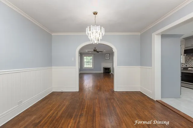a view of livingroom with hardwood floor and hallway
