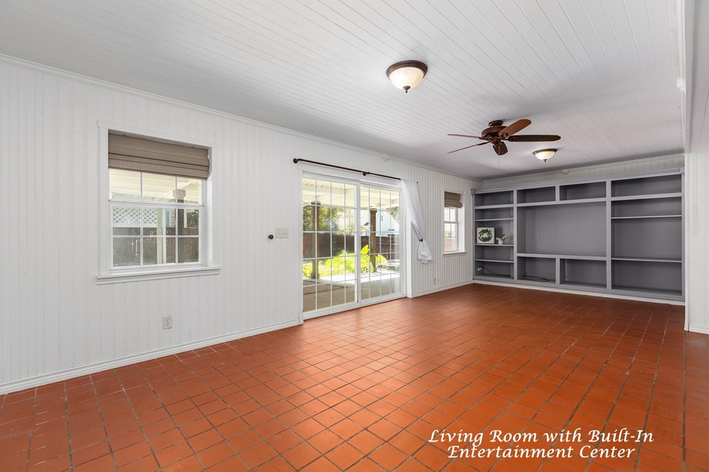 421 House Street Lufkin, TX 75904 - Photo 24 of 46 a view of an empty room with a window and wooden floor