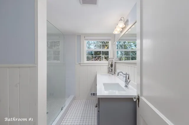 a bathroom with a sink and a bathtub