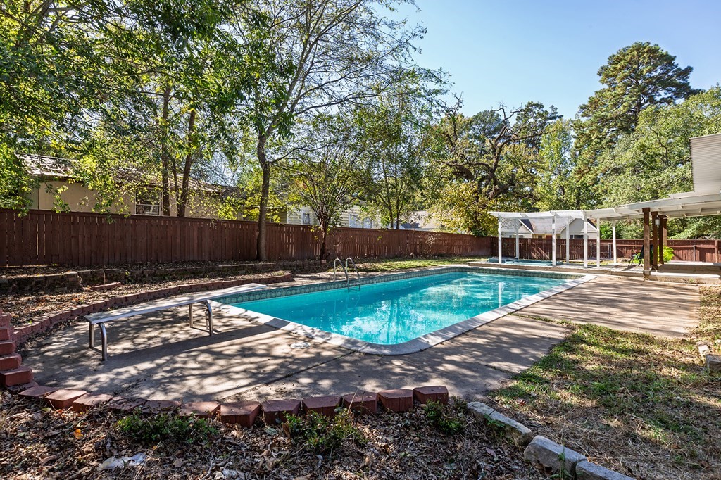 421 House Street Lufkin, TX 75904 - Photo 35 of 46 a view of a backyard with a small cabin