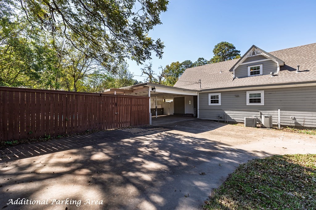 421 House Street Lufkin, TX 75904 - Photo 41 of 46 a view of a white house with a yard