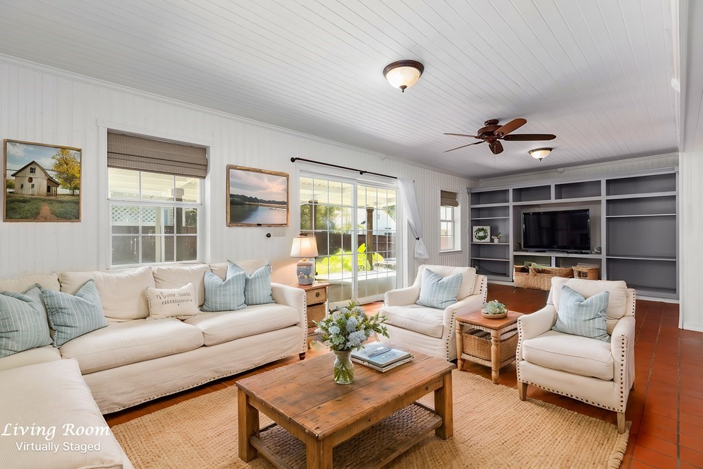 421 House Street Lufkin, TX 75904 - Photo 6 of 46 a living room with furniture ceiling fan and a large window