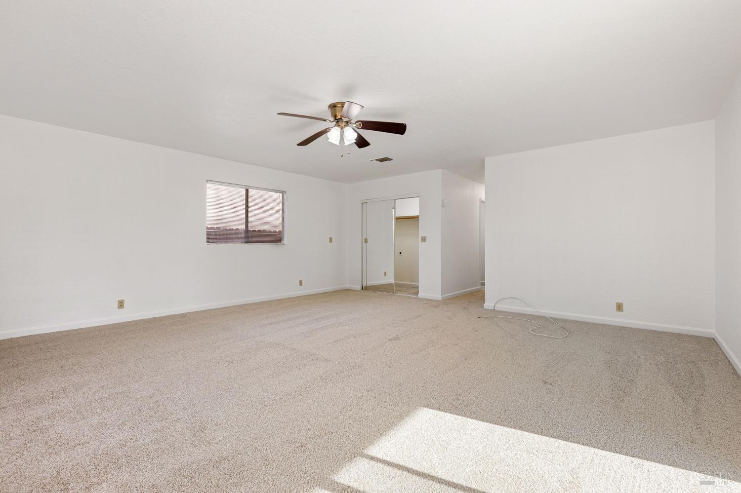 570 Berkeley Way Fairfield, CA 94533 - Photo 21 of 34 a view of a big room with carpet