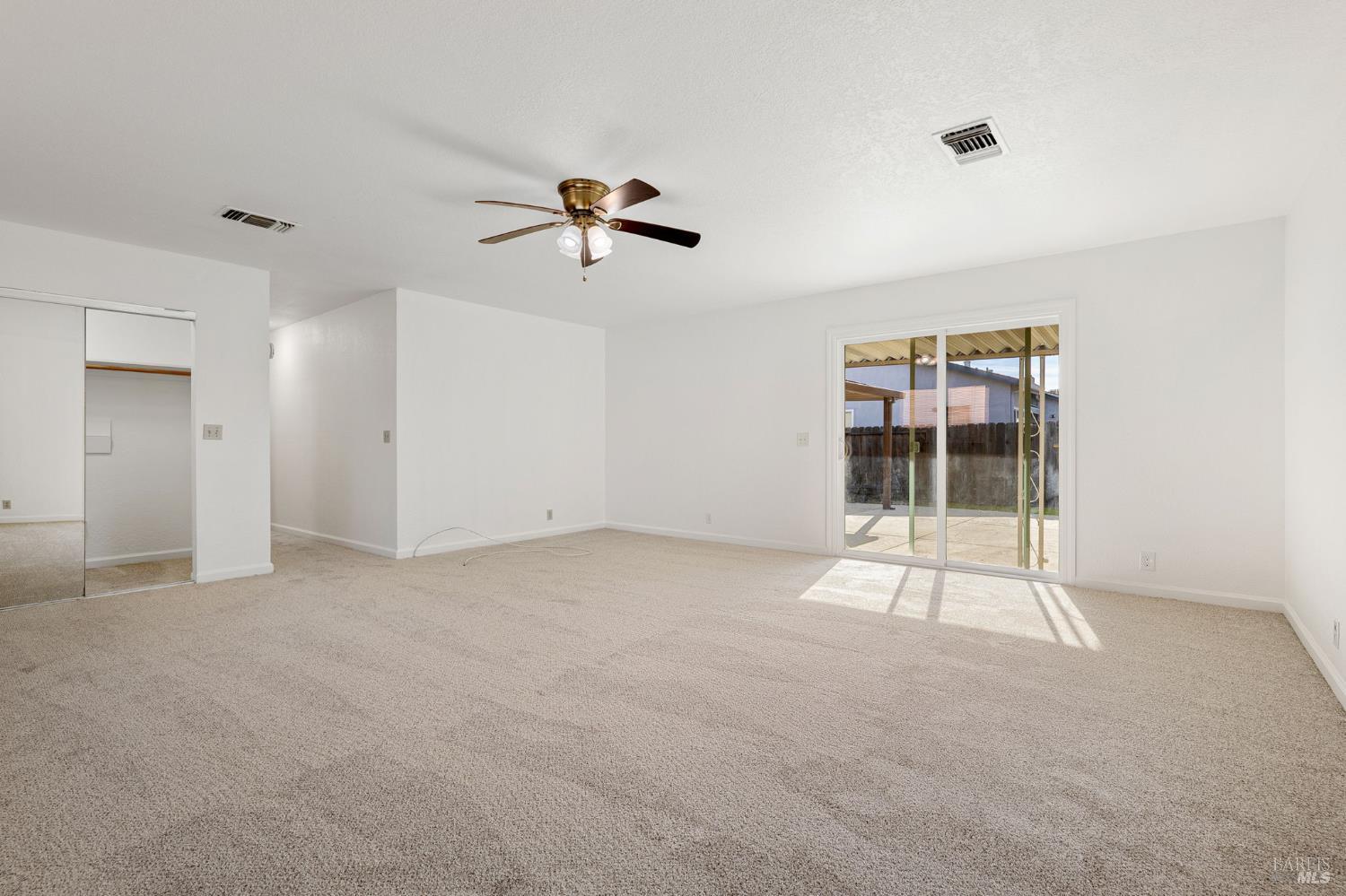 570 Berkeley Way Fairfield, CA 94533 - Photo 22 of 34 a view of empty room with windows