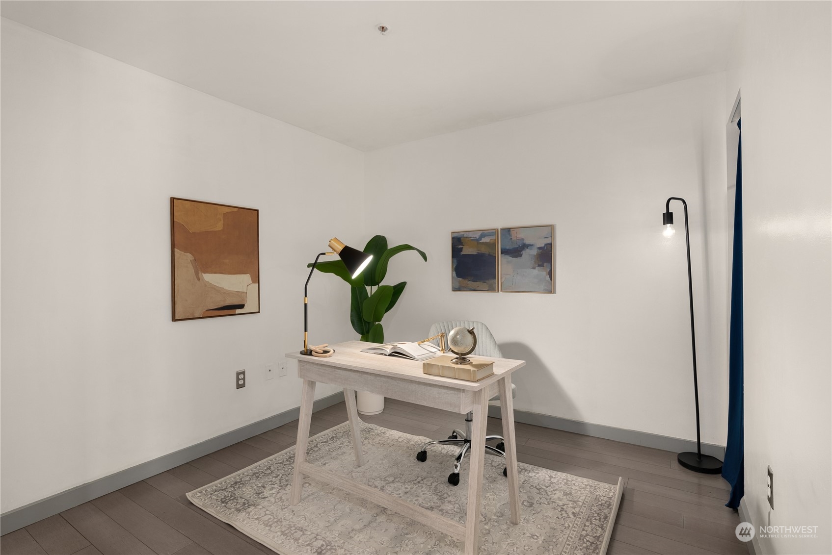 321 10th Avenue South, Unit 508 Seattle, WA 98104 - Photo 15 of 26 a living room with furniture