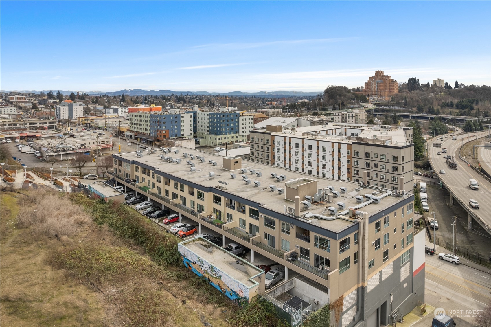 321 10th Avenue South, Unit 508 Seattle, WA 98104 - Photo 23 of 26 a view of a city with tall buildings