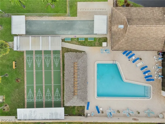 an aerial view of a house with outdoor space