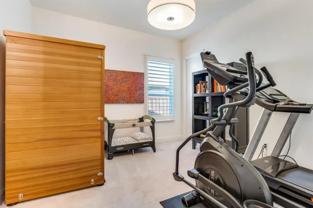 a view of a room with gym equipment
