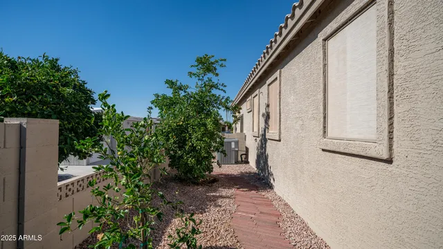 a couple of potted plants in front of door