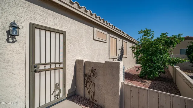 a house view with a backyard space