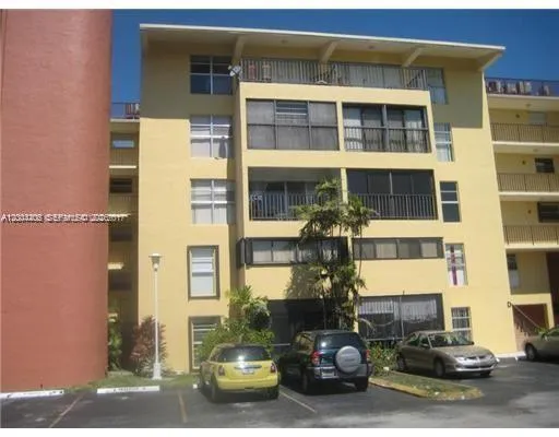 a front view of a building with street view