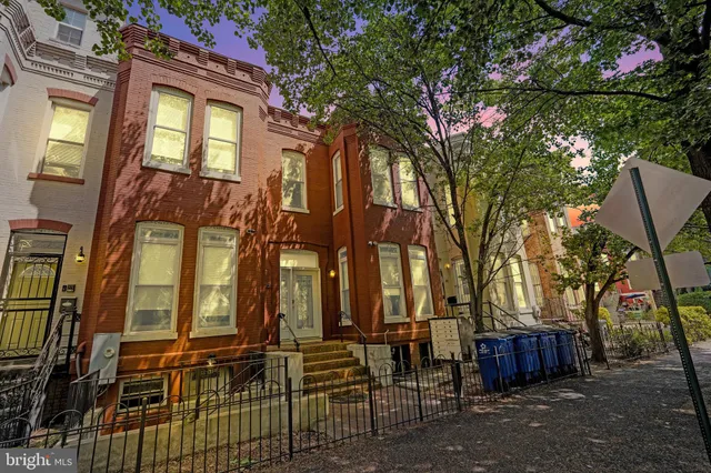 a view of a hallway with staircase