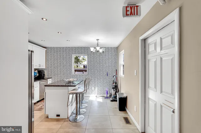 a bedroom with a bed and a table